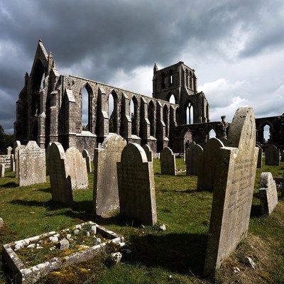 Ruined Gothic Abbey with Gravestones