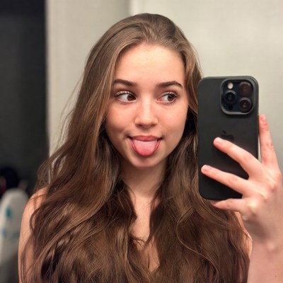 Girl sticking tongue out selfie
