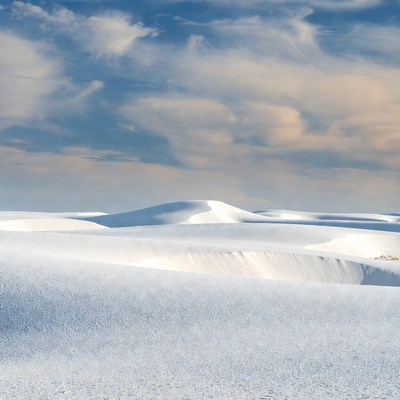 White Sand Dunes Under Blue Sky