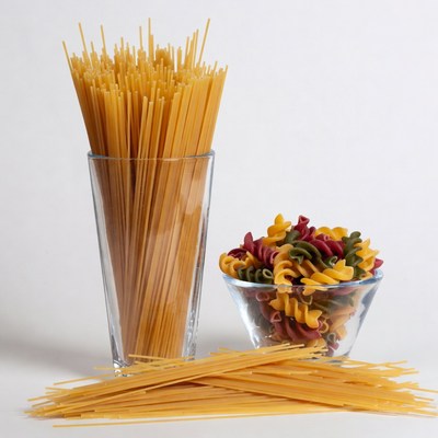 Spaghetti and Colored Pasta in Glasses