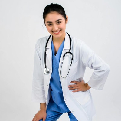 Asian woman doctor smiling with stethoscope