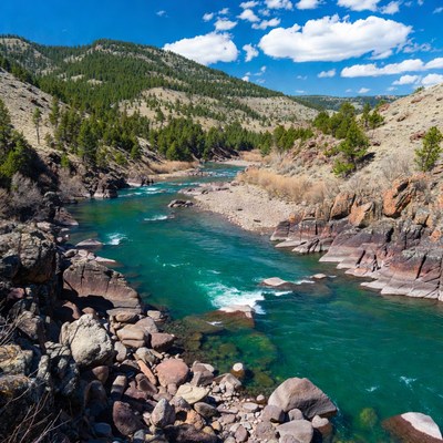 Turquoise River in Mountain Valley