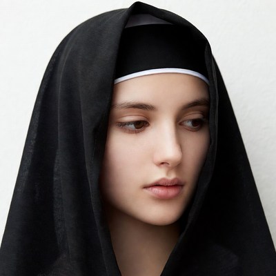 Young woman in nun habit