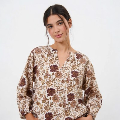 Woman in floral print blouse