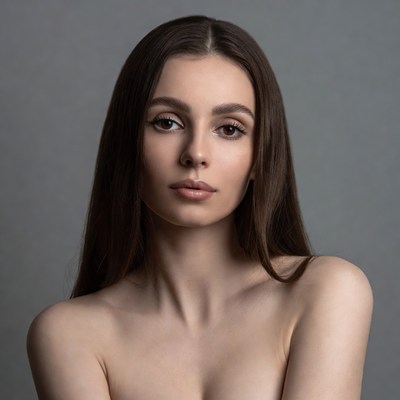 Nude woman with long brown hair