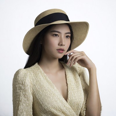 Asian woman in straw hat