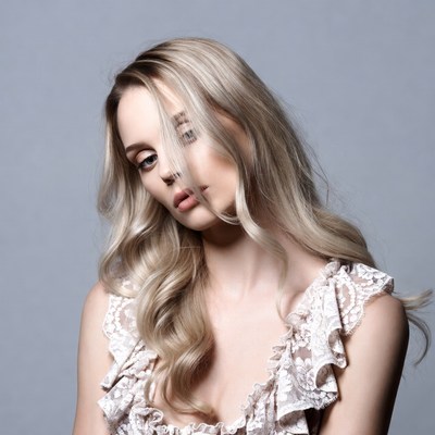 Blonde woman in lace top