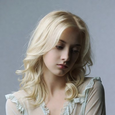 Blonde woman in lace blouse