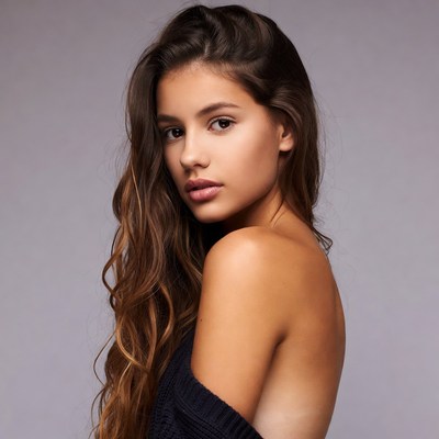 Young woman with wavy brown hair