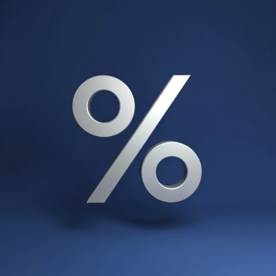 Silver percent symbol on blue
