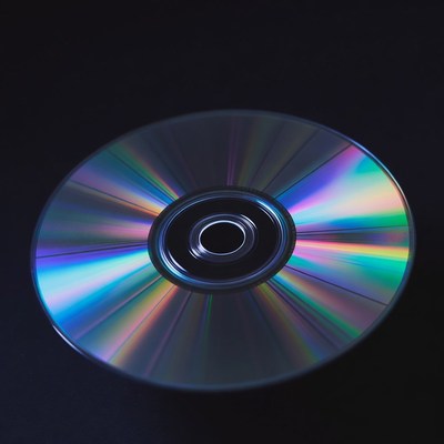 Shiny CD Disc on Black Background