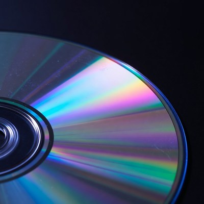 Shiny CD Disc on Black Background