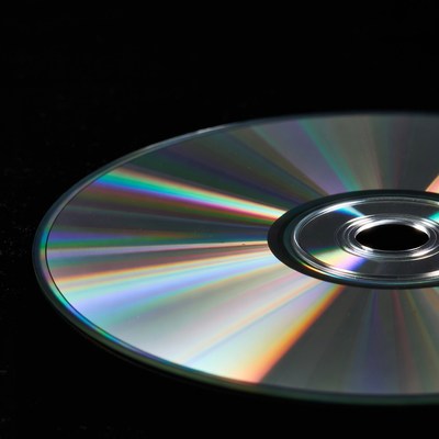 Shiny CD Disc on Black Background