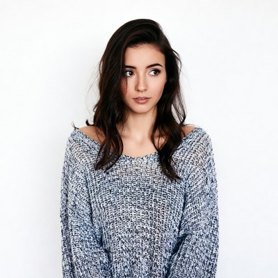 Woman in off-shoulder sweater