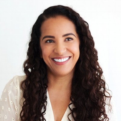 Smiling woman with curly hair