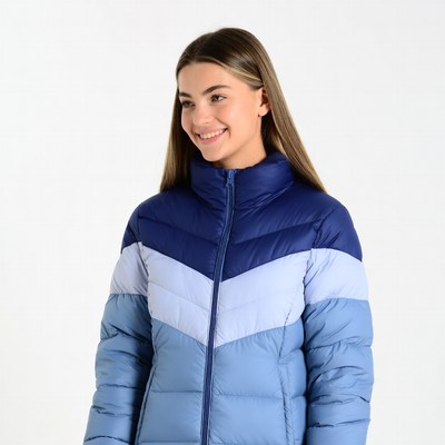Smiling woman in blue puffer jacket