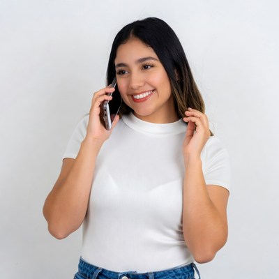 Latina woman smiling on phone call