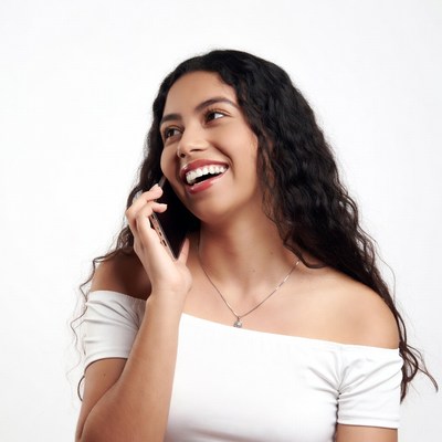 Smiling woman talking on phone