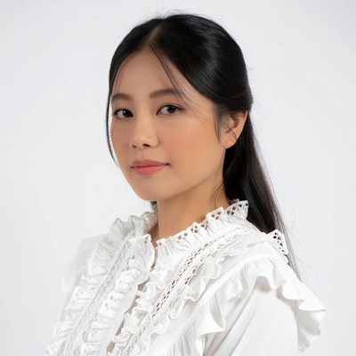 Asian woman in lace blouse