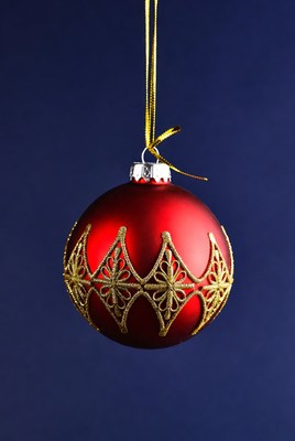 Red Christmas ornament with gold design