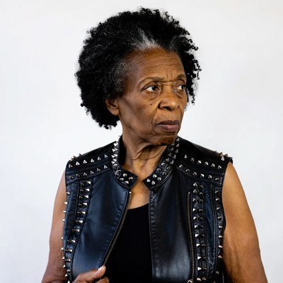 Elderly African-American woman in studded leather vest