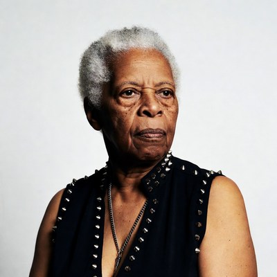 Elderly African-American woman in spiked vest
