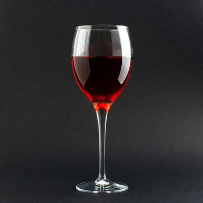 Red Wine Glass on Black Background