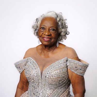 Elderly African-American woman in beaded gown