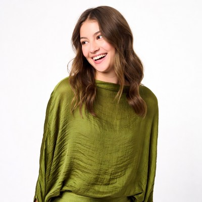 Smiling woman in green dress