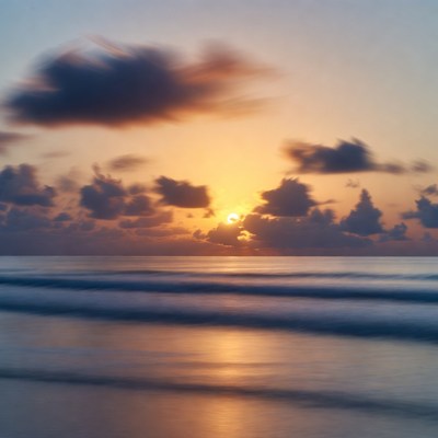 Ocean Sunrise with Clouds and Waves