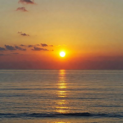Sunset over calm ocean