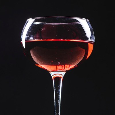Red Wine Glass on Black Background
