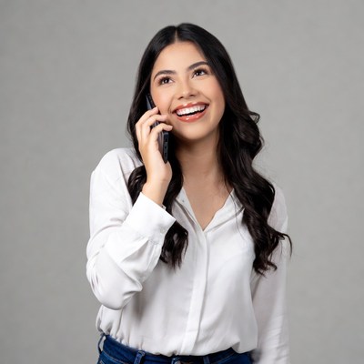 Latina woman smiling on phone call