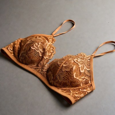 Lace Orange Bra on Gray Surface