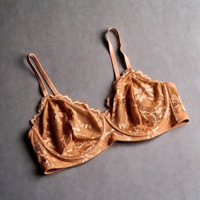 Orange Lace Bra on Gray Surface