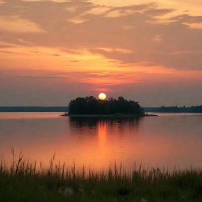 Sunset Behind Island in Lake
