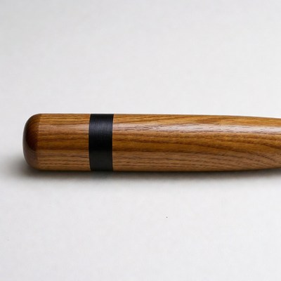Wooden baseball bat with black stripe