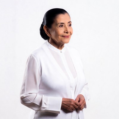 Elderly Asian woman in white blouse