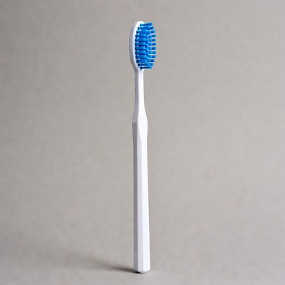 Blue Bristle Toothbrush on Gray Background