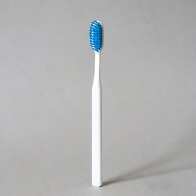 Blue bristled toothbrush