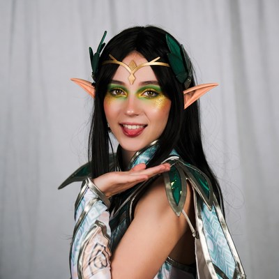 Woman in green elf cosplay