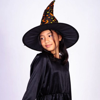 Asian girl in witch hat costume