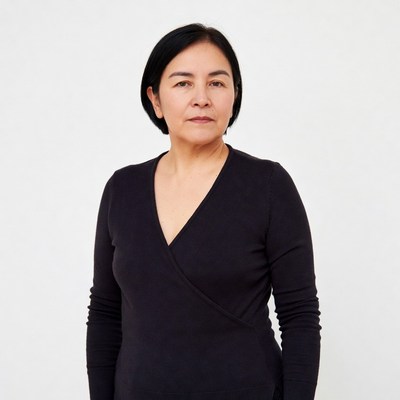 Asian woman in black wrap sweater
