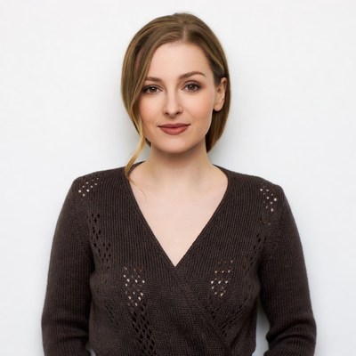 Woman in brown knit sweater