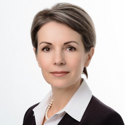 Professional woman in suit and pearls