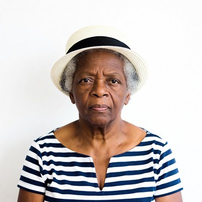 Elderly African-American woman in straw hat