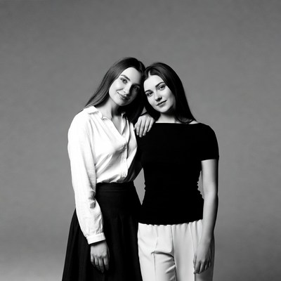 Two women smiling together