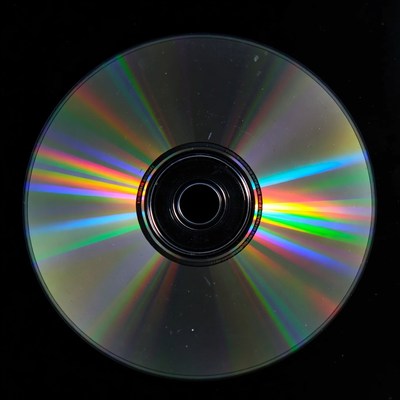 Shiny CD Disc on Black Background