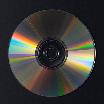 Shiny CD Disc on Black Background