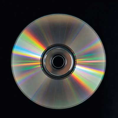 Shiny CD Disc on Black Background
